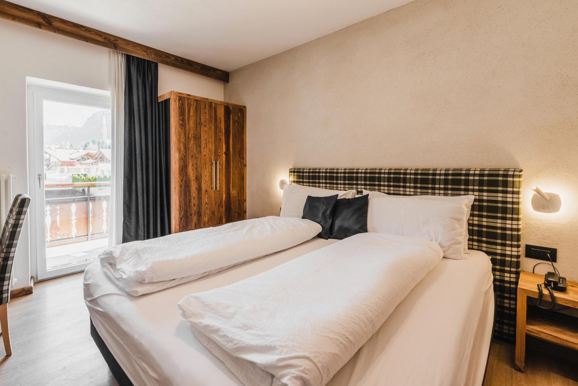 Hotel Arnika ポッツァ・ディ・ファッサ エクステリア 写真